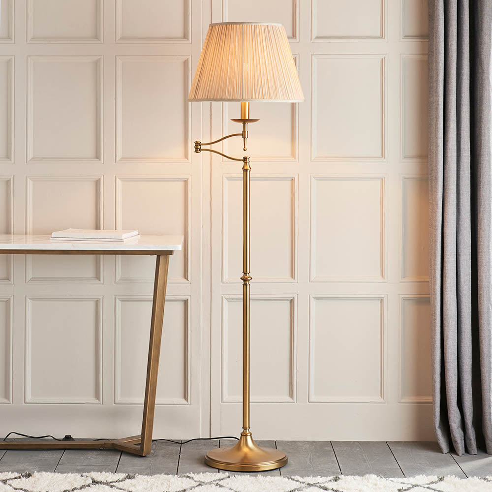 Interiors 1900 Stanford Swing Floor Lamp Antique Brass with Champagne Shade